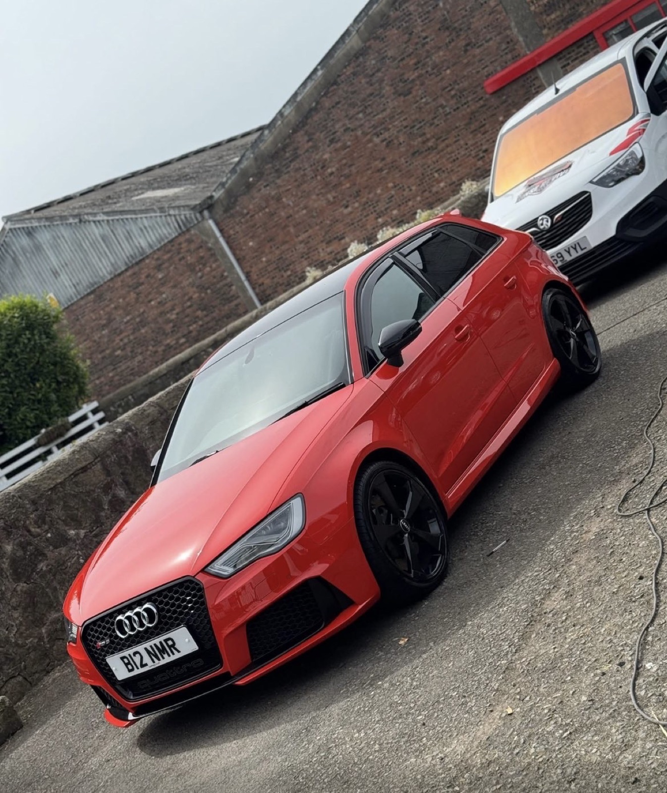 Red Audi RS3 after a full exterior detail