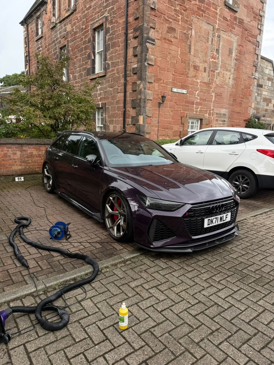 Merlin purple Audi RS6 Avant detailed on the driveway in Falkirk