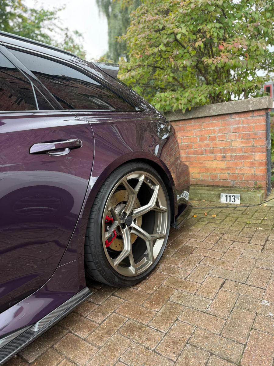 Audi RS6 Avant rear quarter and bronze alloy wheel after a full detail