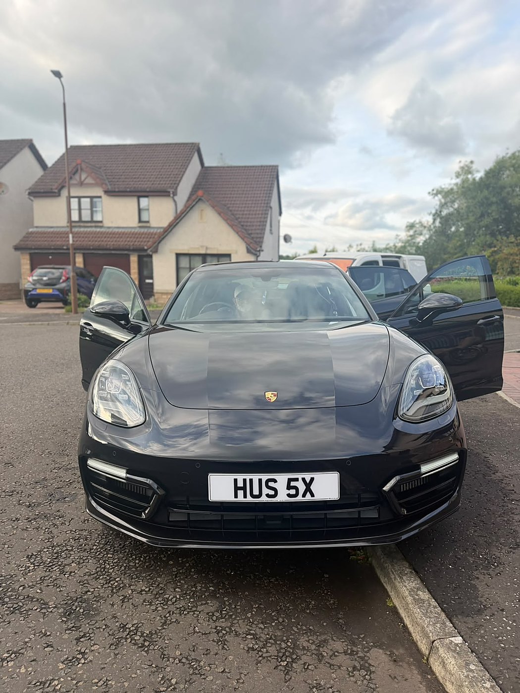 Black Porsche after a full exterior detail